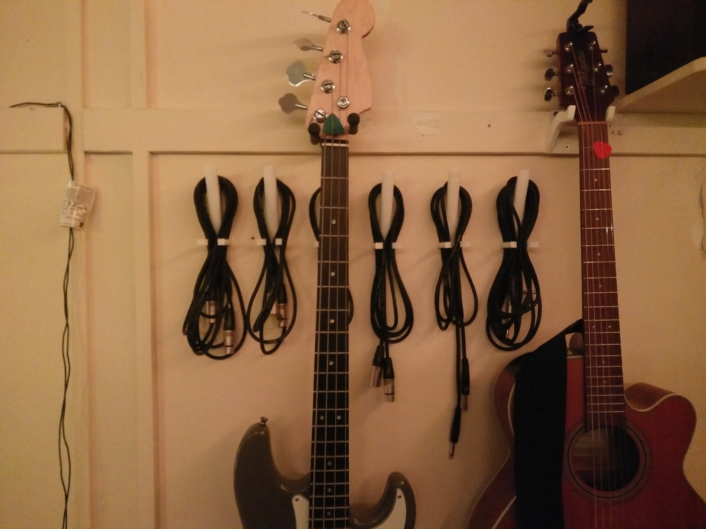 Musikkabelhaken – Organisation von Musikkabeln