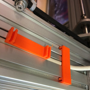 Lasersaur-Kabelklemme für effizientes Kabelmanagement
