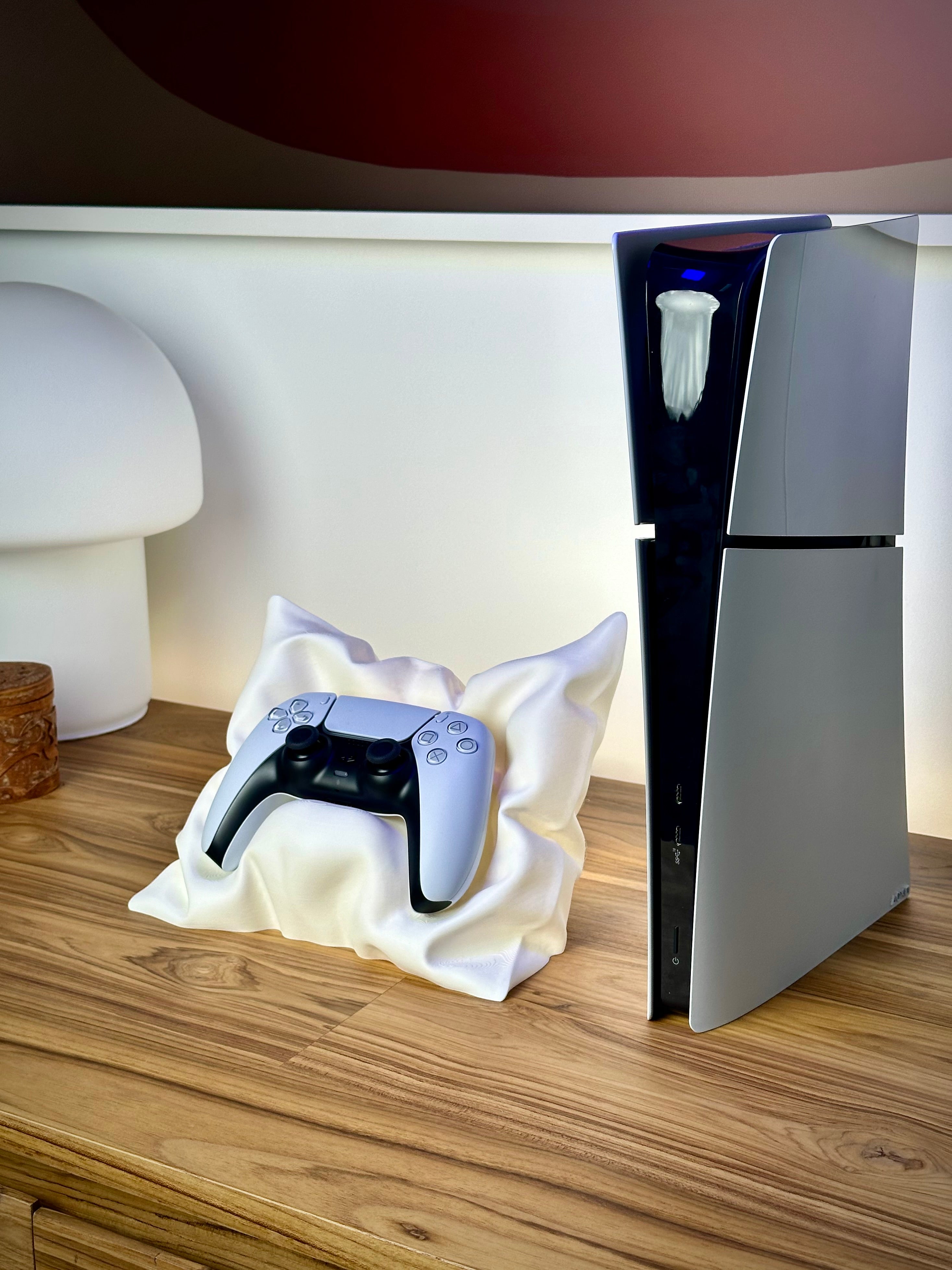Stylischer PS5-Controller-Ständer in Kissenform