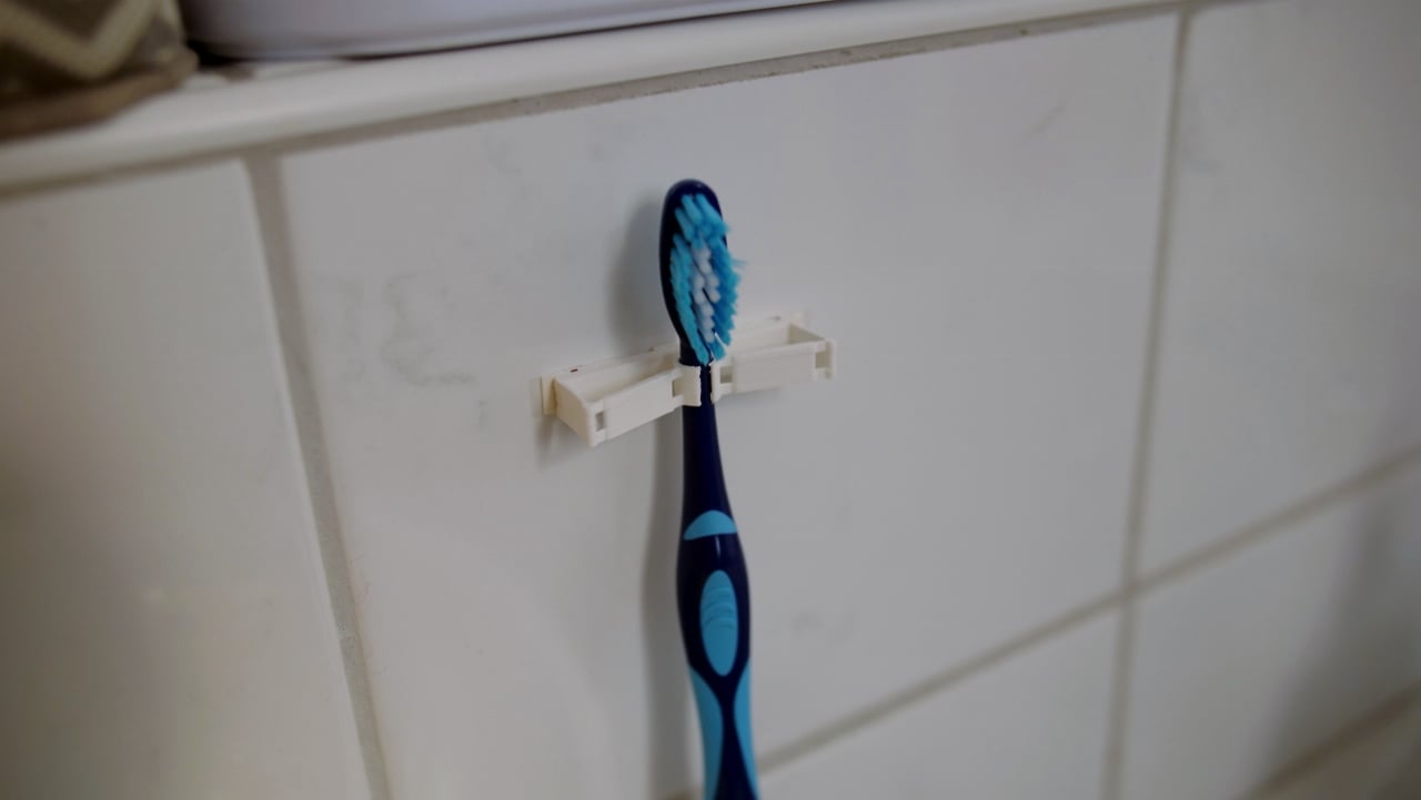Kompatibler Zahnbürstenhalter mit flexiblem Mechanismus