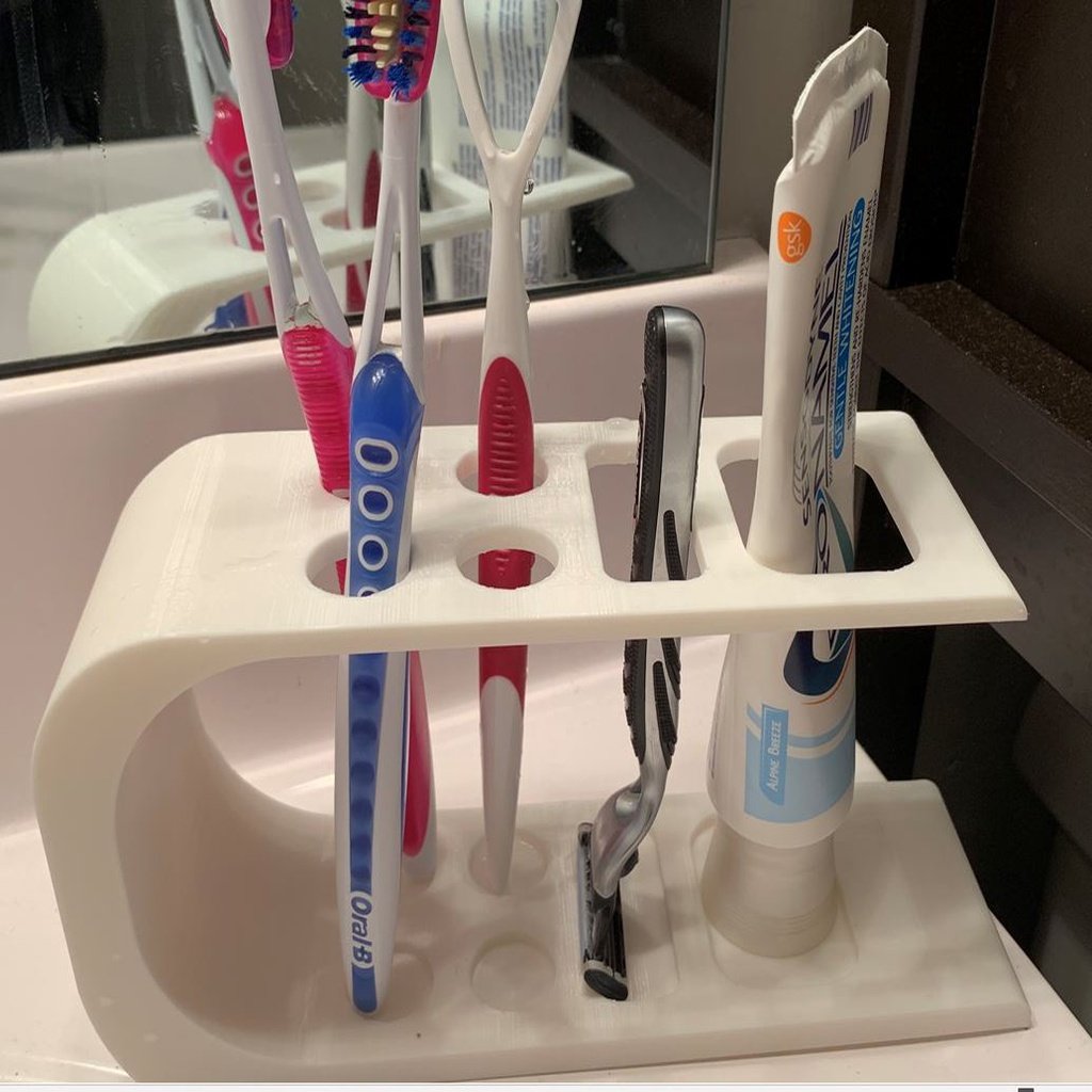 Zahnbürstenhalter mit Rasierständer und Zahnpastatubenhalter